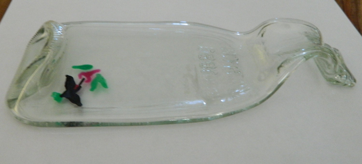 Upcycled soda bottle with hummingbird spoon Rest or odds and ends bowl