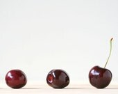Food photography, kitchen art, fruit photograph, red cherry, minimalist -- "Offbeat", a 5x5-inch fine art photo
