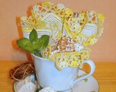 Repurposed Tea Cup & Saucer.  Tropical.  Table Decor.  Vignette. Imported Hankie.  Sea Shells, Sea Glass, Faux Succulents