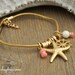 Seaside Gold Charm Bracelet, Ivory and Pink Coral by Cheydrea
