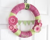 Nursery Yarn Wreath. Girl Baby Shower Gift. Personalized Gift, Yarn Wreath with Bunting. Pink and Green. 12 Inches.