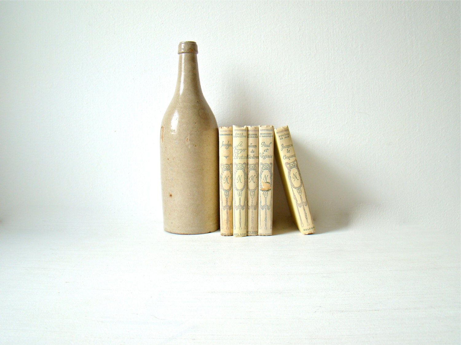 Lovely wedding decor, neutral summer shades, beach decorating, Nelson collection, 1930s, pale yellow french books, spring books