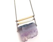 Eliza -- amethyst geode with brass tubes