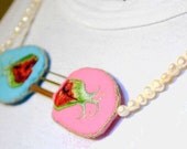 Embroidered Necklace Longing: Blue and Pink kissy mouths with tentacles