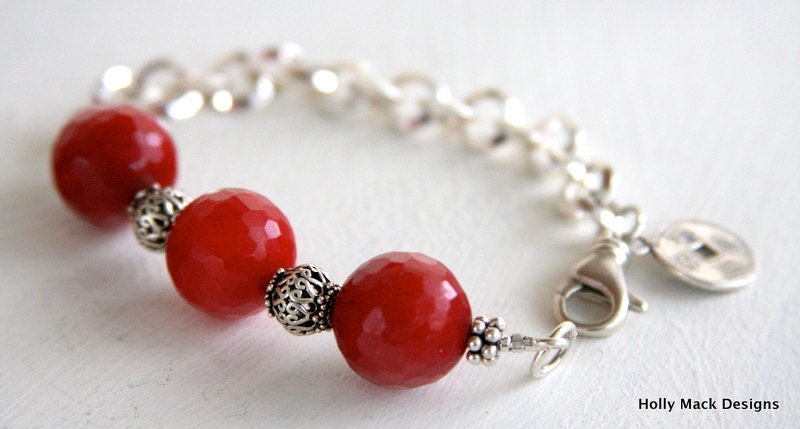 SALE... Red Jade bracelet with sterling silver beads, sterling silver chain and a sterling silver coin charm dangling on the side