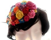 Floral fascinator in tropical colors. Paradise ascot wedding mother of the bride