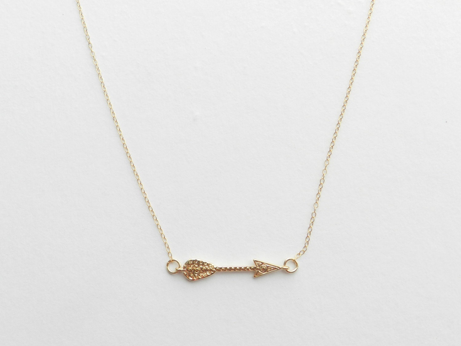Arrow necklace on 14k gold filled chain.