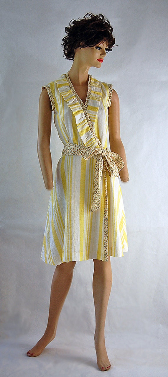 Vintage inspired yellow and white linen wrap dress. Fits sIze 0 to 2.