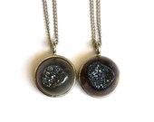 The titanium blue druzy moon pendant necklace