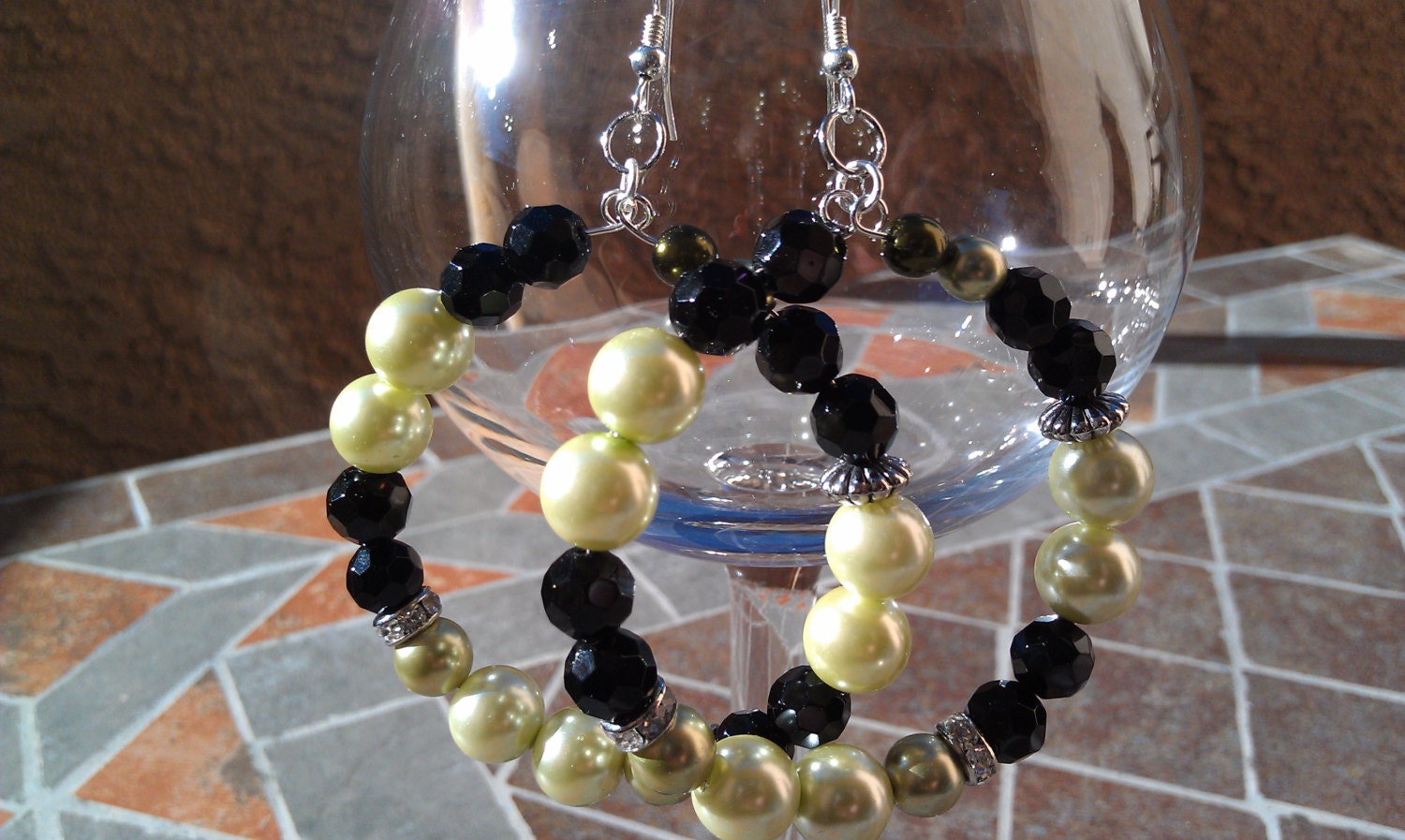 Light green pearl and black beaded hoop earrings