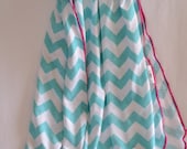 Aqua blue and pink blanket. Swaddler. Size- 31 by 40 inches. Chevron print. (Made by lippybrand)