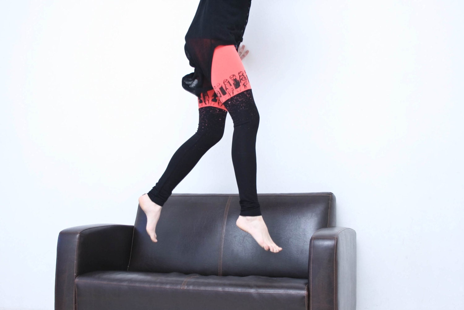 Coral and black color block leggings