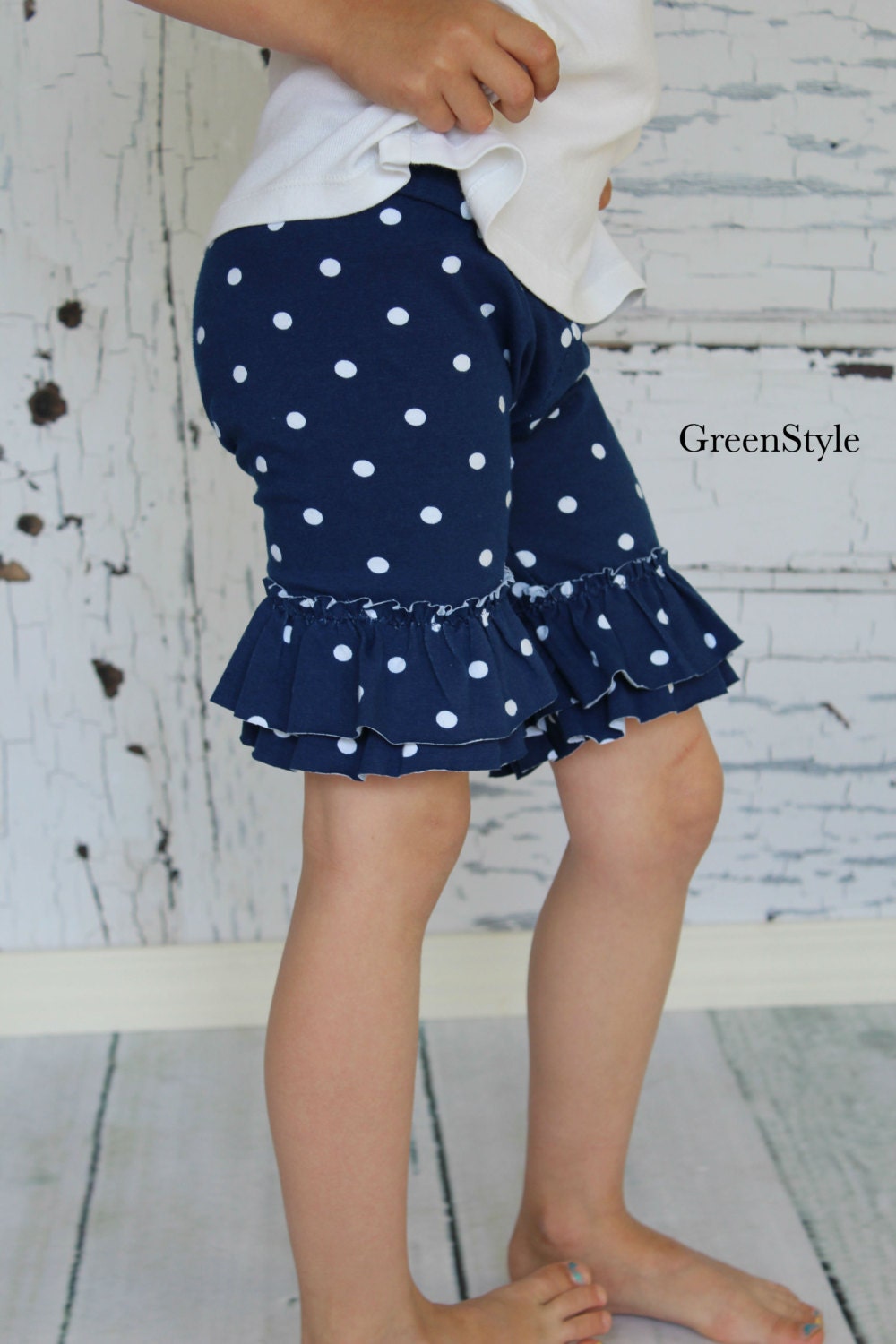 Knee length ruffled shorties in Nautical navy and white polka dots from GreenStyle
