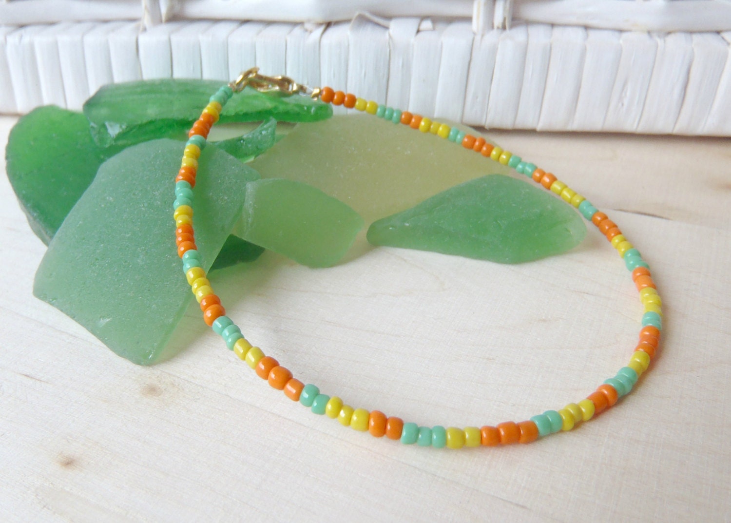 anklet in orange, aloe green and yellow for everyday or at the beach