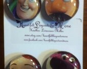 set of four Glass magnets with Toy Story characters.