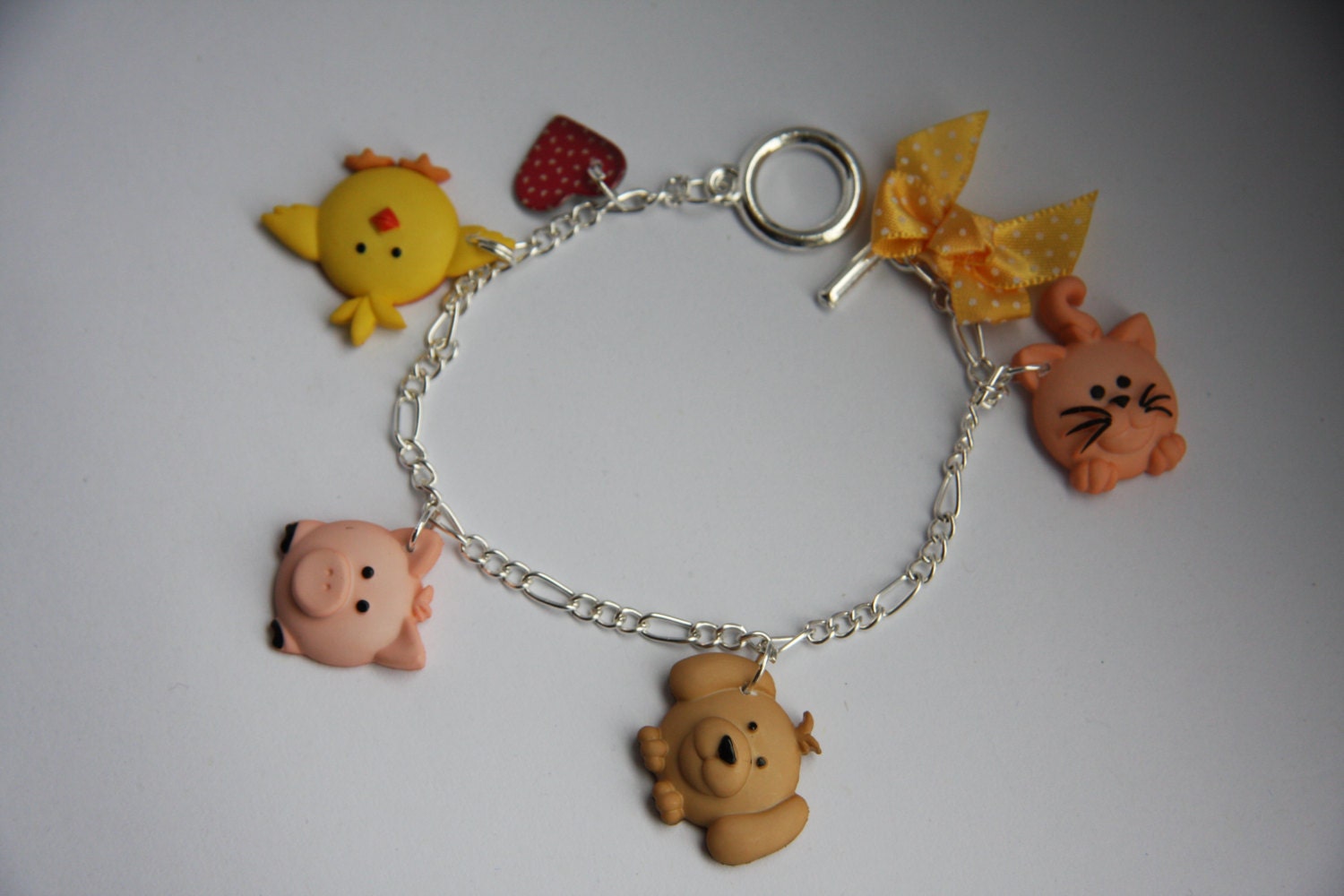 Silver Plated Podgy Pets/Cute Animals Themed Charm Bracelet. -With Toggle Clasp.