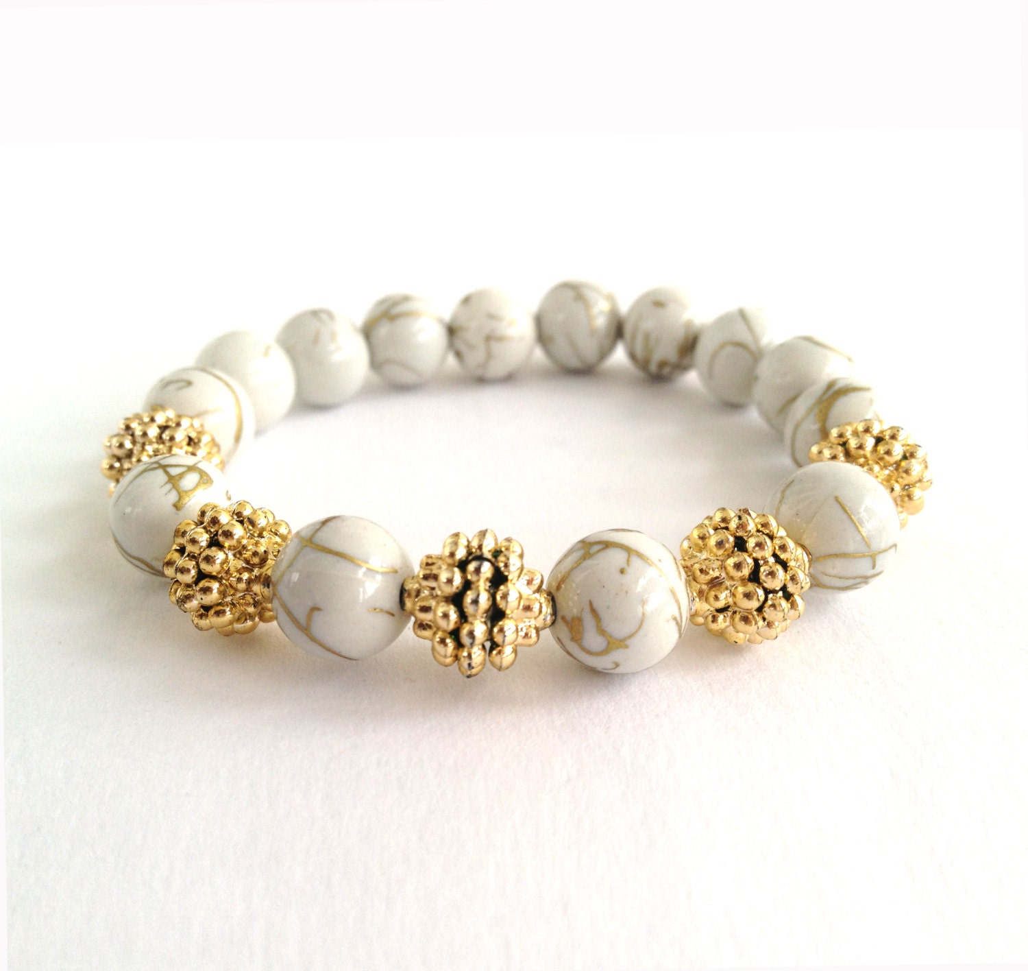 Gold Drizzled White Arm Candy Bead Bracelet with Gold Stardust Balls