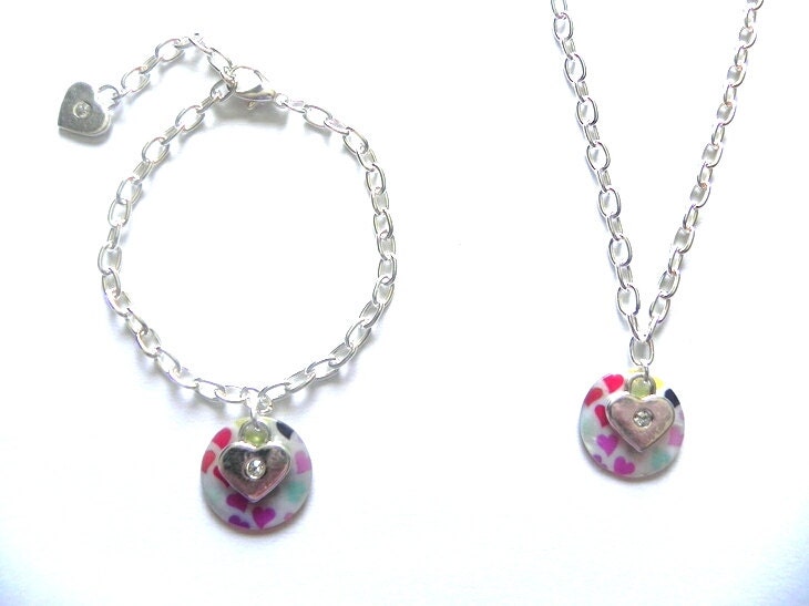 Handmade Shell Bracelet and Necklace set. Features Heart Lock charm. Perfect for Mother's Day