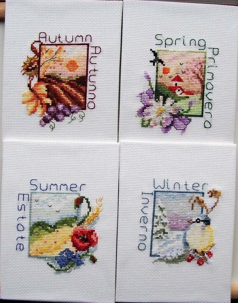 Set of 4 Cross Stitched Ready To Frame Unframed Pictures Depicting The Four Seasons-Autumn,Spring,Summer & Winter.