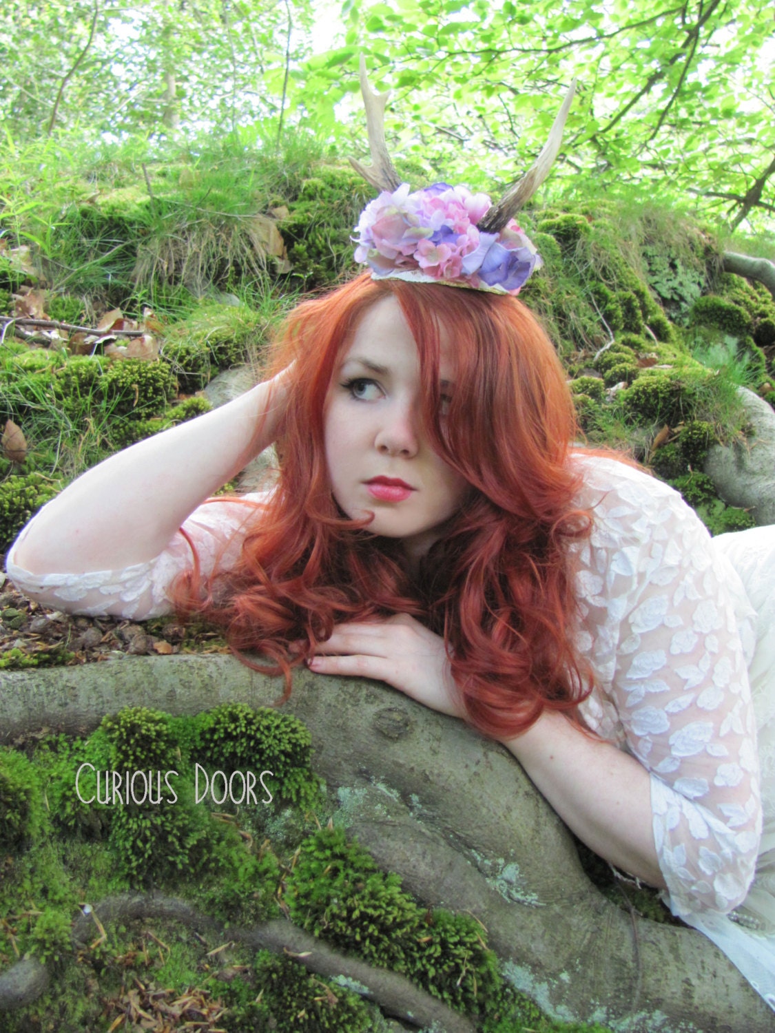 Faun horn fascinator with mixed pink, and purple flowers, deer antlers, flowers, fantasy