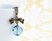 Mottled Blue Glass Beaded Necklace, Brass Bow, Brass Chain