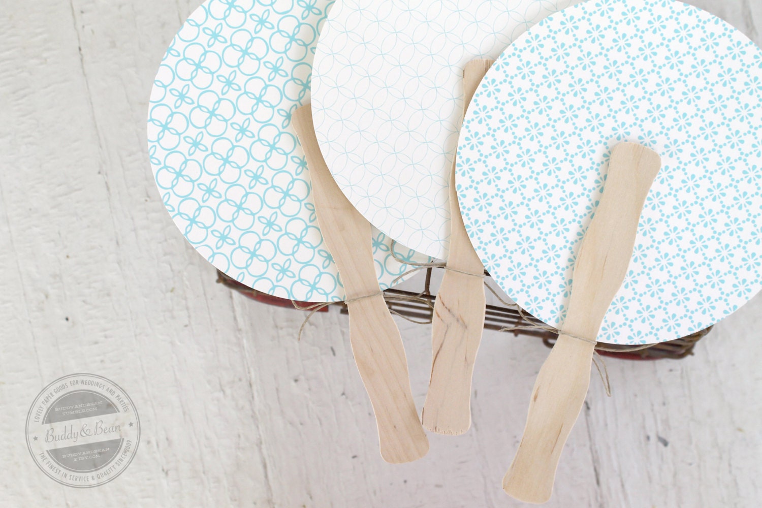 Round program fan. 3 patterns. sky blue on cream