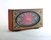 Vintage wooden clock from Russia