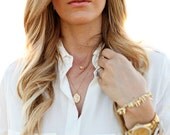 Gold CZ leaf necklace.