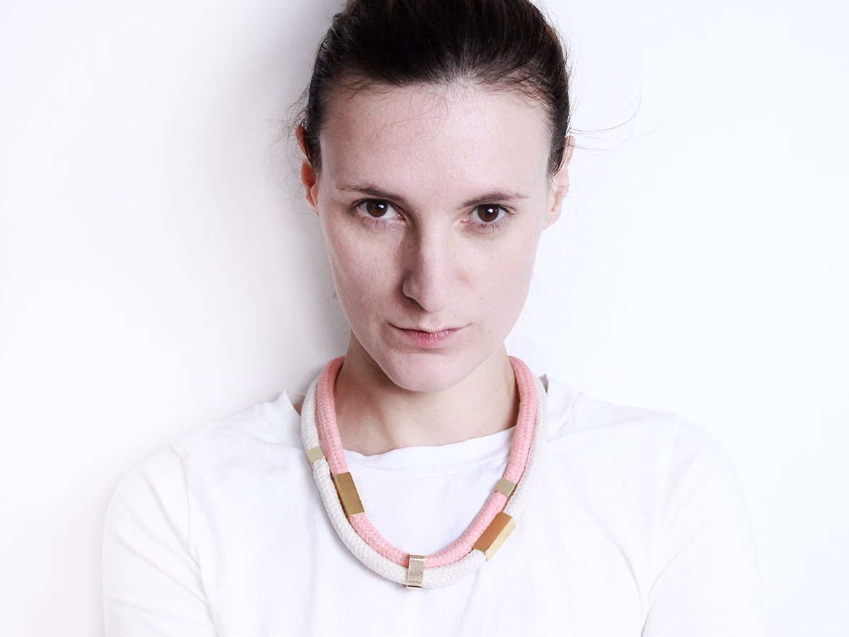 Cord necklace in apricot and creme with beads