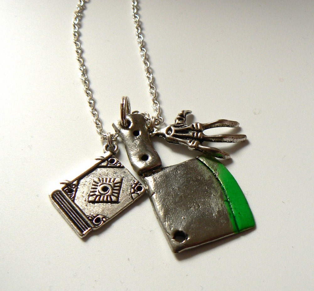 Book of the Dead horror-themed charm necklace
