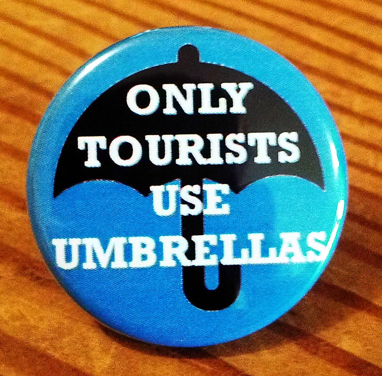 In Portland only tourists use umbrellas BUTTON