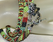 Demeter ... Necklace . Bead Crochet . Multicolor . Earthy . Picasso . Lime Green . Brick Red . Turquoise . Mottled . Turquoise . Black