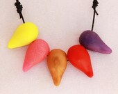 Neon yellow, pink, purple and gold and red comma bead adjustable resin necklace
