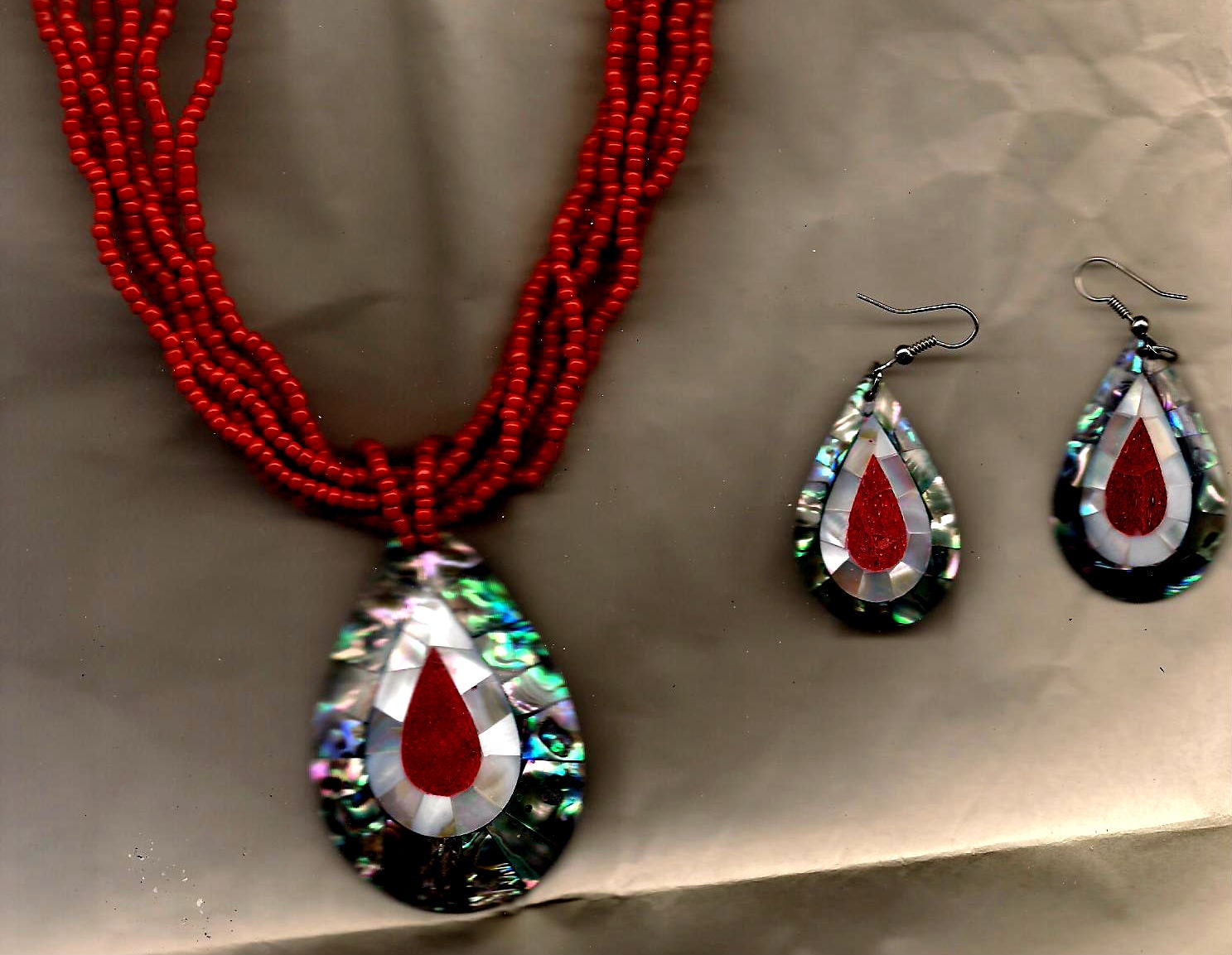 Peaceful Pele Necklace and Earrings Set In Shell And Coral