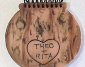 Carved love initials in a tree bark pen and note pad set
