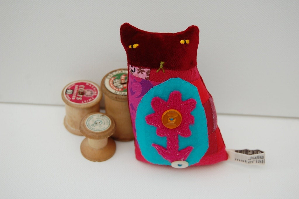 A small ornamental textile kitten called 'Frida'