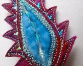 Gorgeous felt flame leaf brooch.