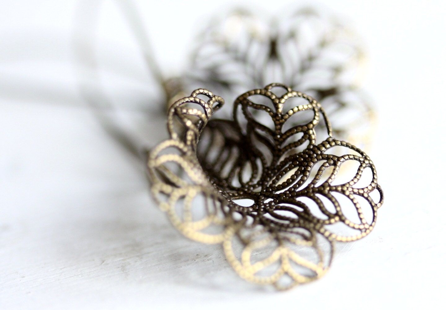 Brass colored lacy lily earrings - filigree
