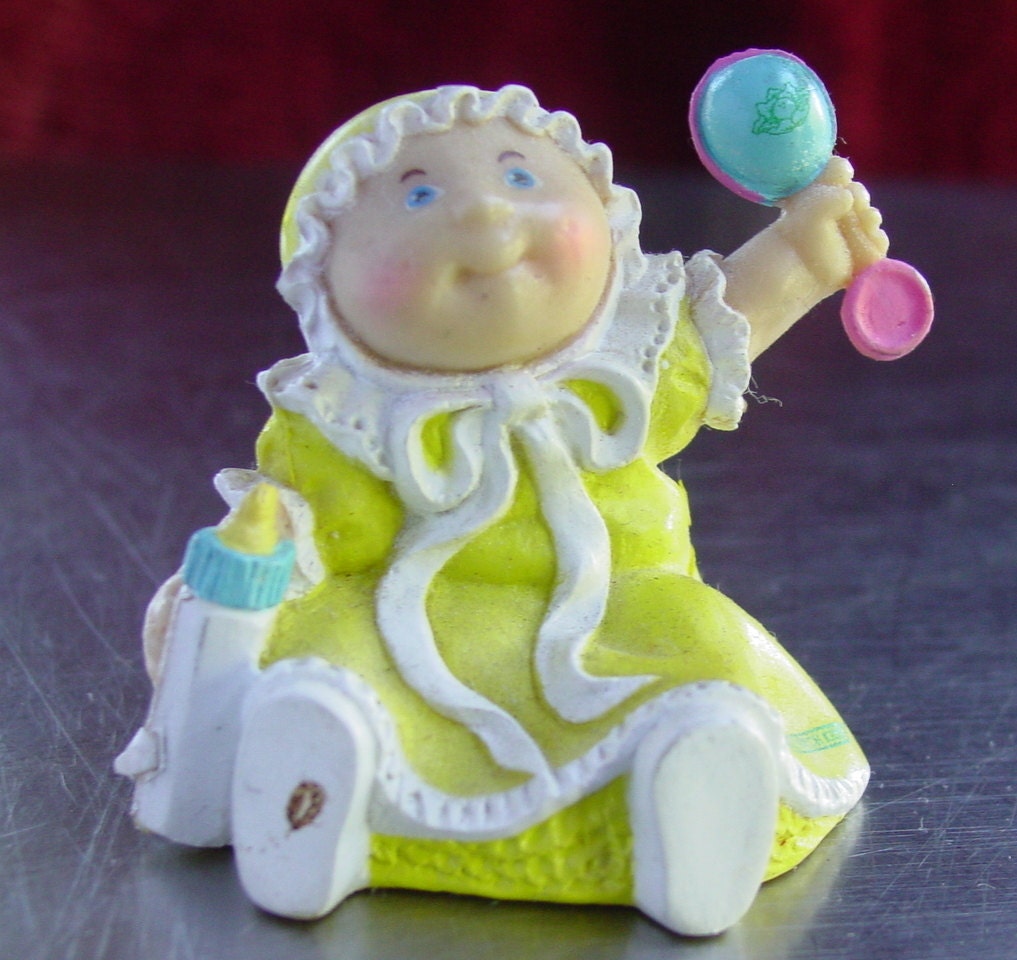 Cabbage Patch Kids Mini PVC Figure, Baby in Yellow Bonnet with Rattle & Bottle, 2" tall, 1984