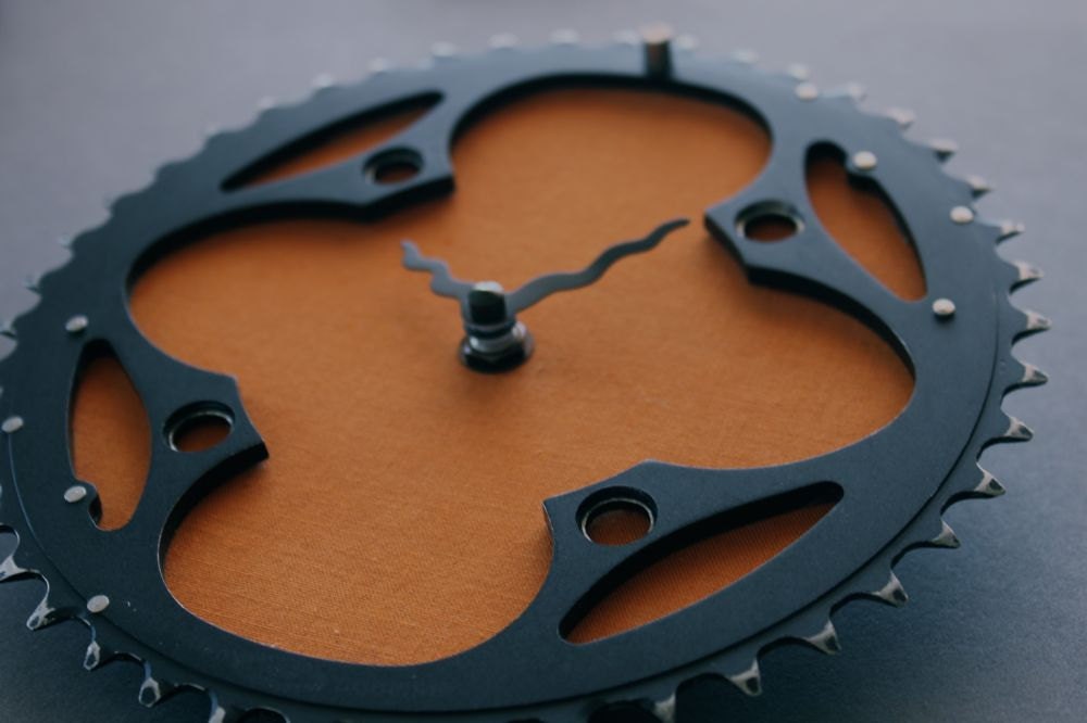 bicycle clock - mountain orange