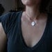 Seed Pods, a layered silhouette pendant