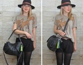 FURROW /// black leather slouchy bag with red and blue tassel