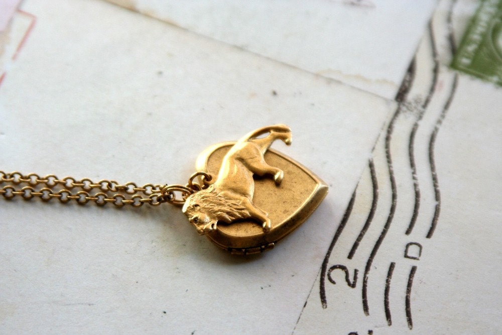 lion. locket necklace. gold ox jewelry