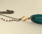 Asymmetrical Pendant Necklace, Teal Necklace, Long Boho Necklace, Raw Stone, Blue Teal, Gold Clover Quatrefoil, Garnet Wire Wrapped