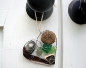 Dark Heart Seaglass Suncatcher with Driftwood, Barnacle, Pottery, and Beach Stone