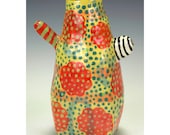Unidentified Resting Object. 4 Footed Eccentric Vase.