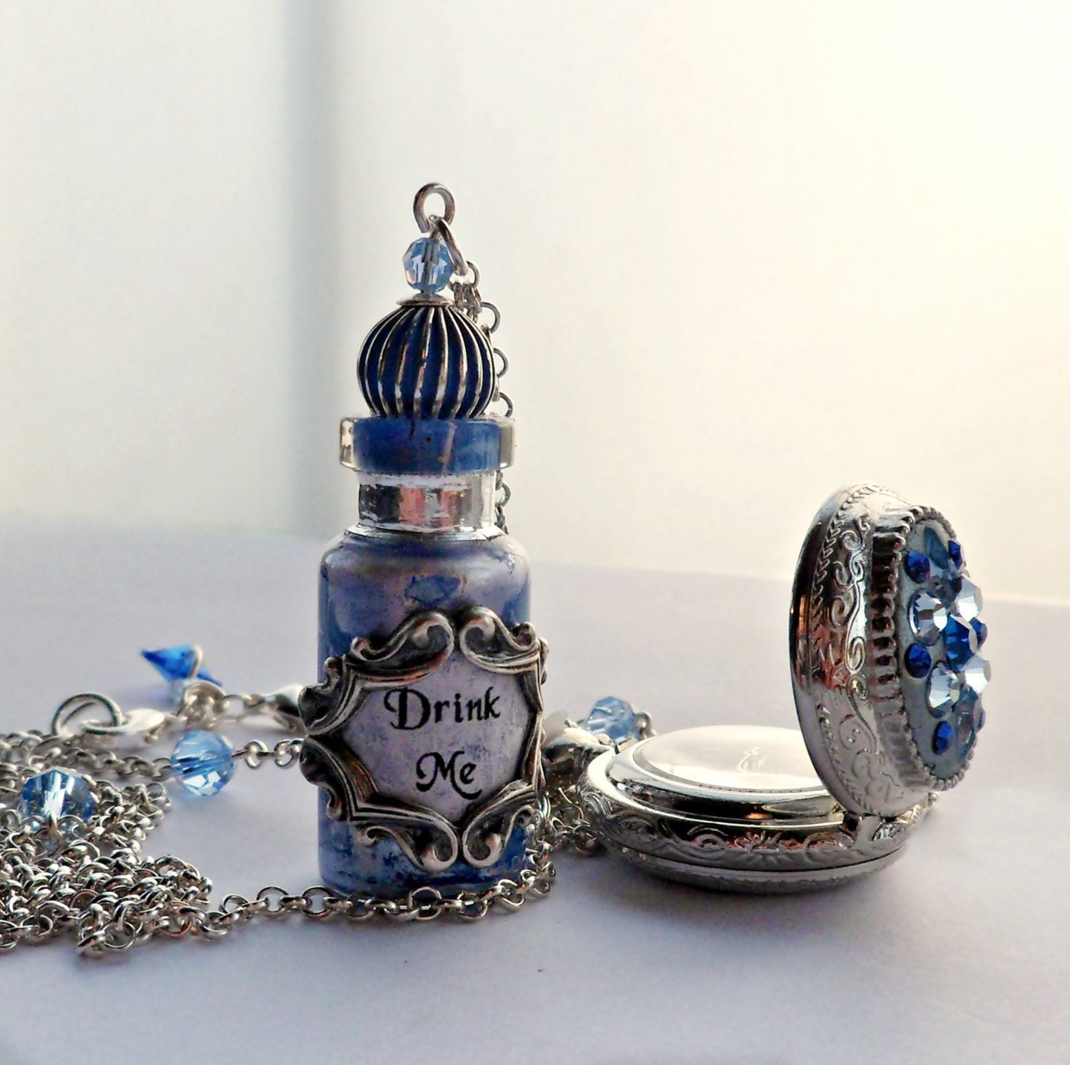 Alice in Wonderland Silver and Sapphire Crystal Pocket Watch and Drink Me Bottle Necklace