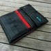 Eco friendly padded mini iPad sleeve made with reclaimed seat belts.
