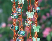 Iridescent Emerald Green Suncatcher with Copper Wrapped Glass Marble Prisms and Spring Green Glass Butterflies