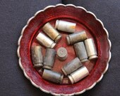 12 empty brass shell casings - 21x10mm